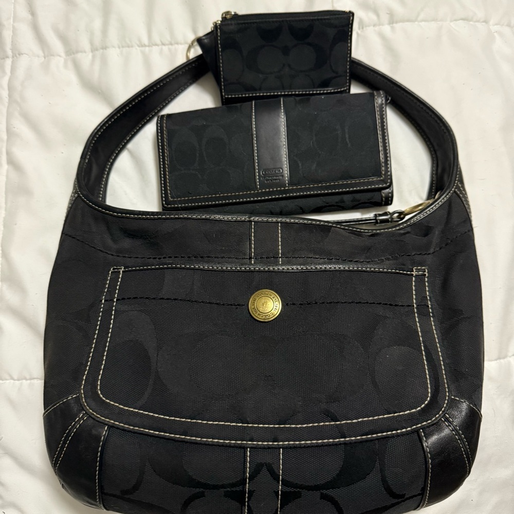 Coach Black Shoulder Bag with Curved Handle and Textured Fabric